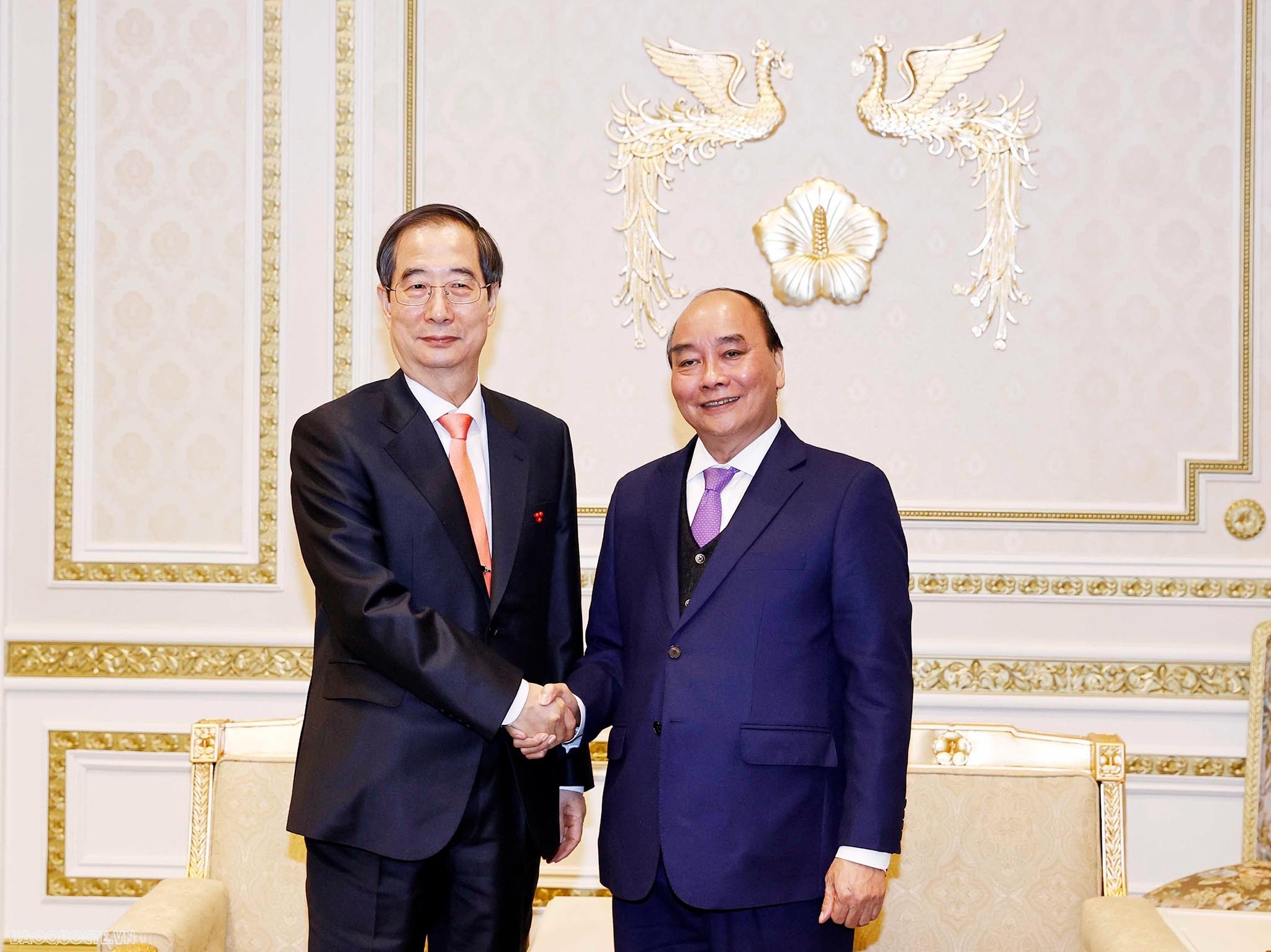Chủ tịch nước Nguyễn Xuân Phúc hội kiến Thủ tướng Hàn Quốc Han Duck Soo.
